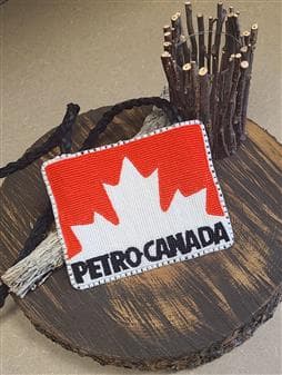 A Petro-Canada logo made by Shantel Nawash using traditional Indigenous beadwork techniques