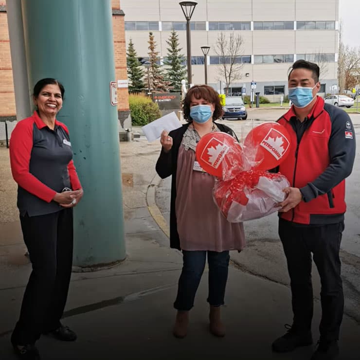 Petro-Canada team members donating to a hospital.