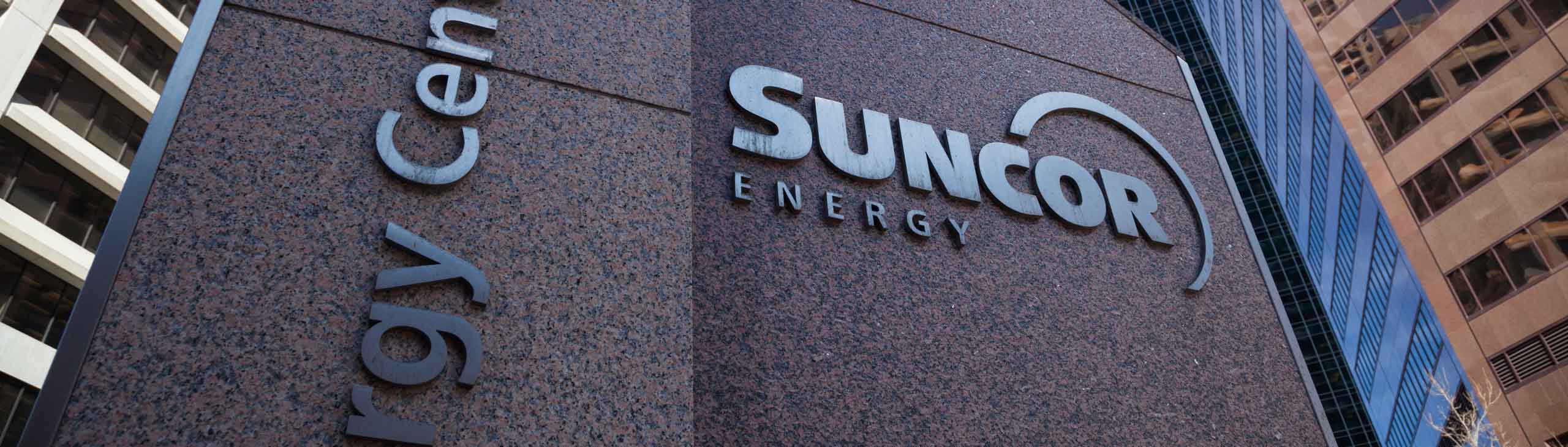 The granite sign in front of the Suncor Energy Centre.